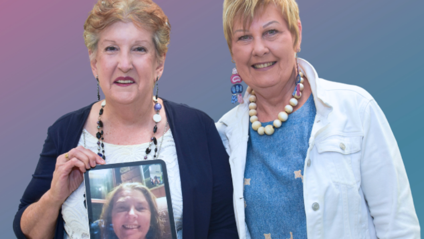 Two senior nurses holding an ipad with the face of a third senior nurse in frame