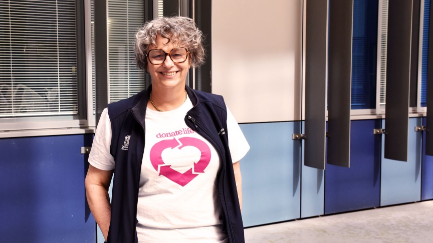 Nurse standing outside in a Donate Life t-shirt 