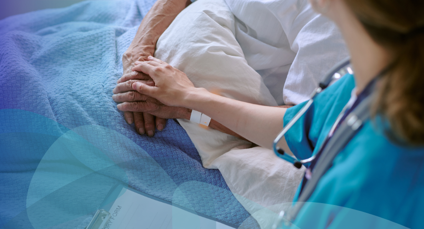Health professional with an elderly patient in a hospital setting