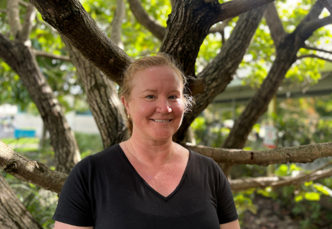 Female staff member smiling