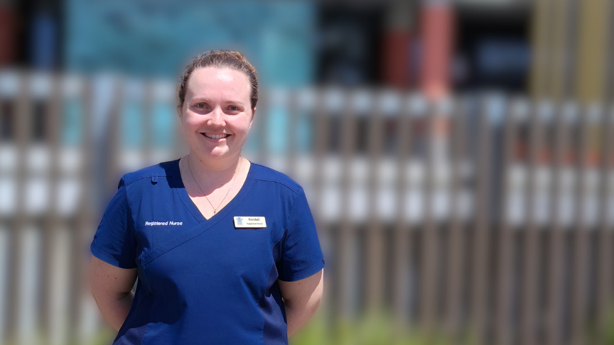 Smiling female clinician outside