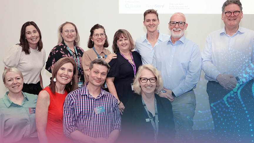 A group of people standing together at the AMHS Research Symposium, with a digital network graphic overlay at the bottom