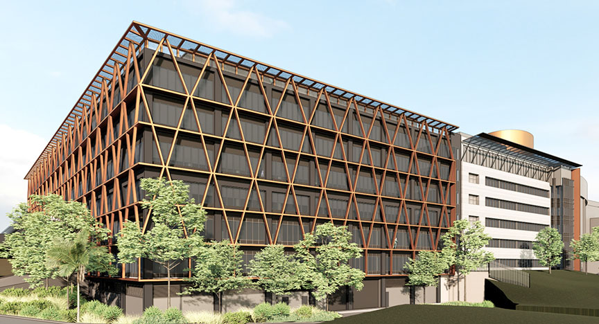 Artist's impression of a modern hospital building with a crisscross wooden facade and surrounding greenery.