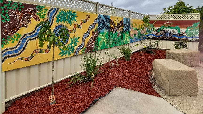 Beaudesert Hospital's Gathering Circle with fresh red bark and bush tucker plants