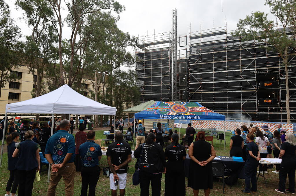 QEII staff, visitors, and Aboriginal and Torres Strait community representatives attending QEII's National Close the Gap Day event. 