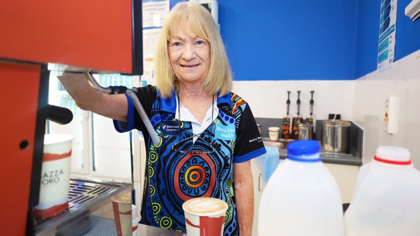 woman making coffee.