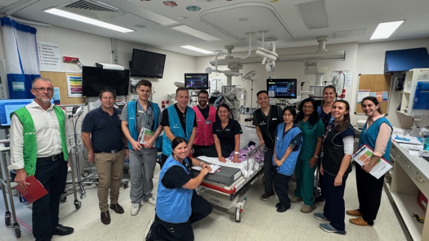 Group picture of Bayside Health Staff taking part in a stroke simulation