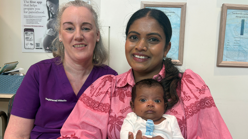Nurse, mother and baby