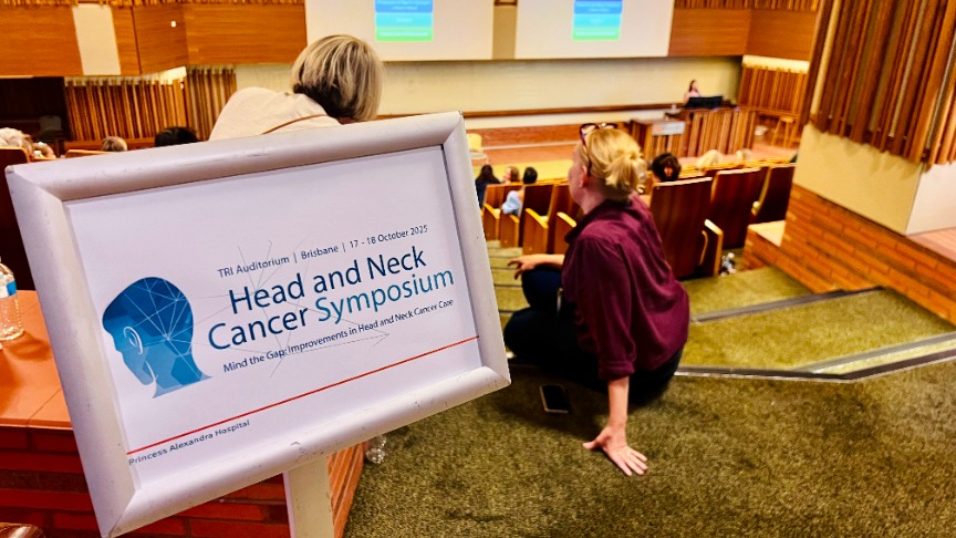 Inside shot of an event sign in a conference room