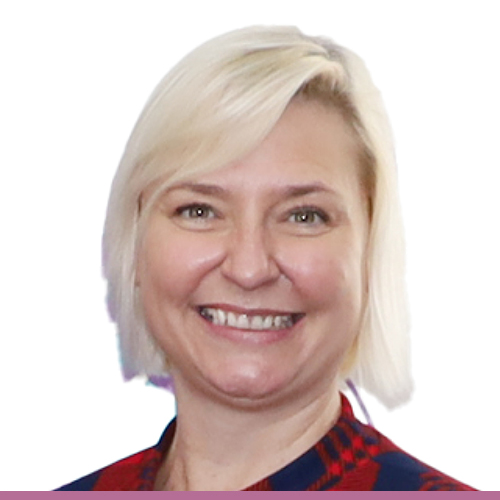 A person with short blonde brown hair, a red and white checked top, against a white background.