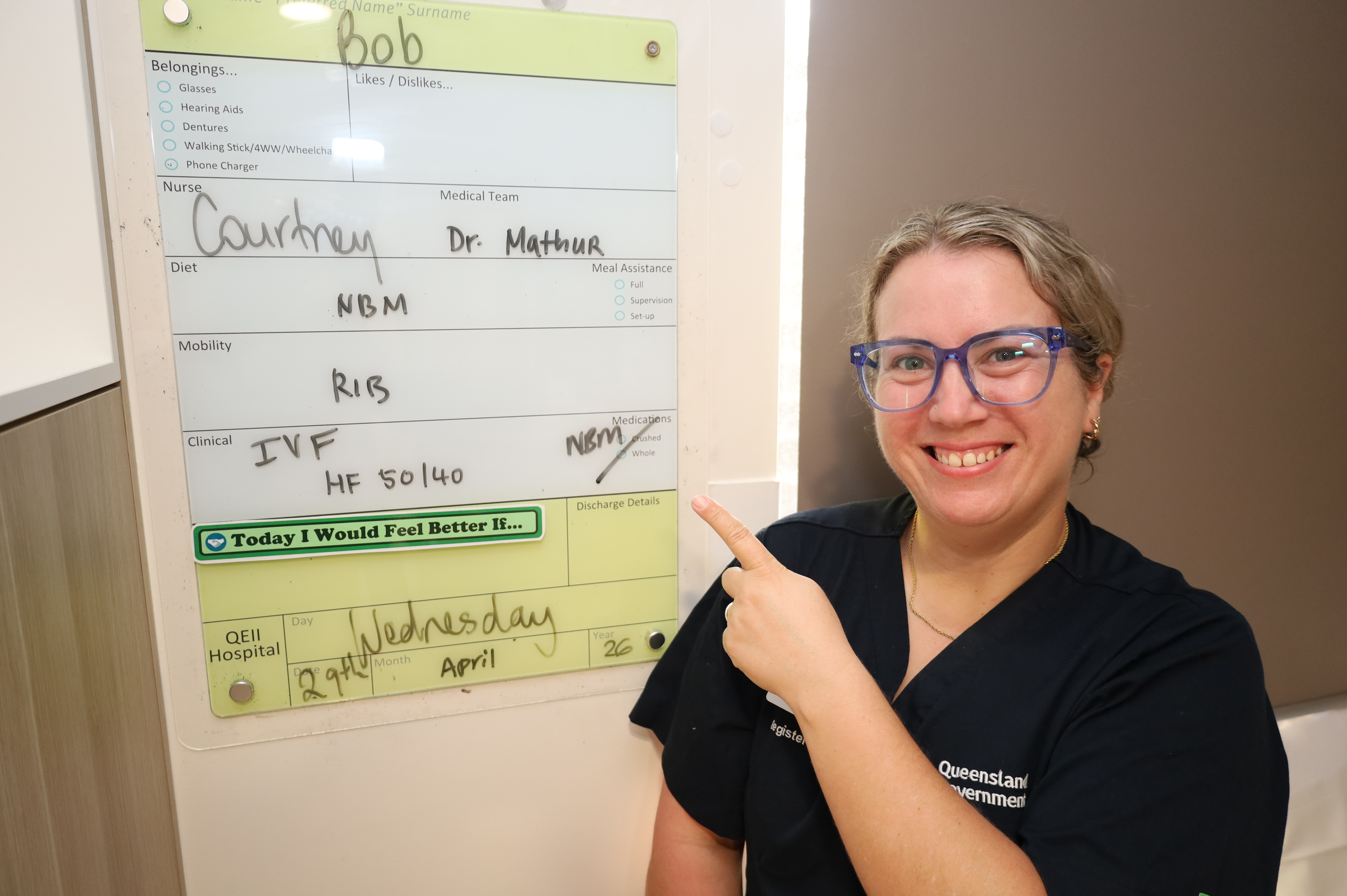 Registered Nurse Courtney Richardson with the improved consumer journey board