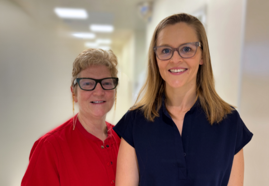 Two female anaesthetists smiling